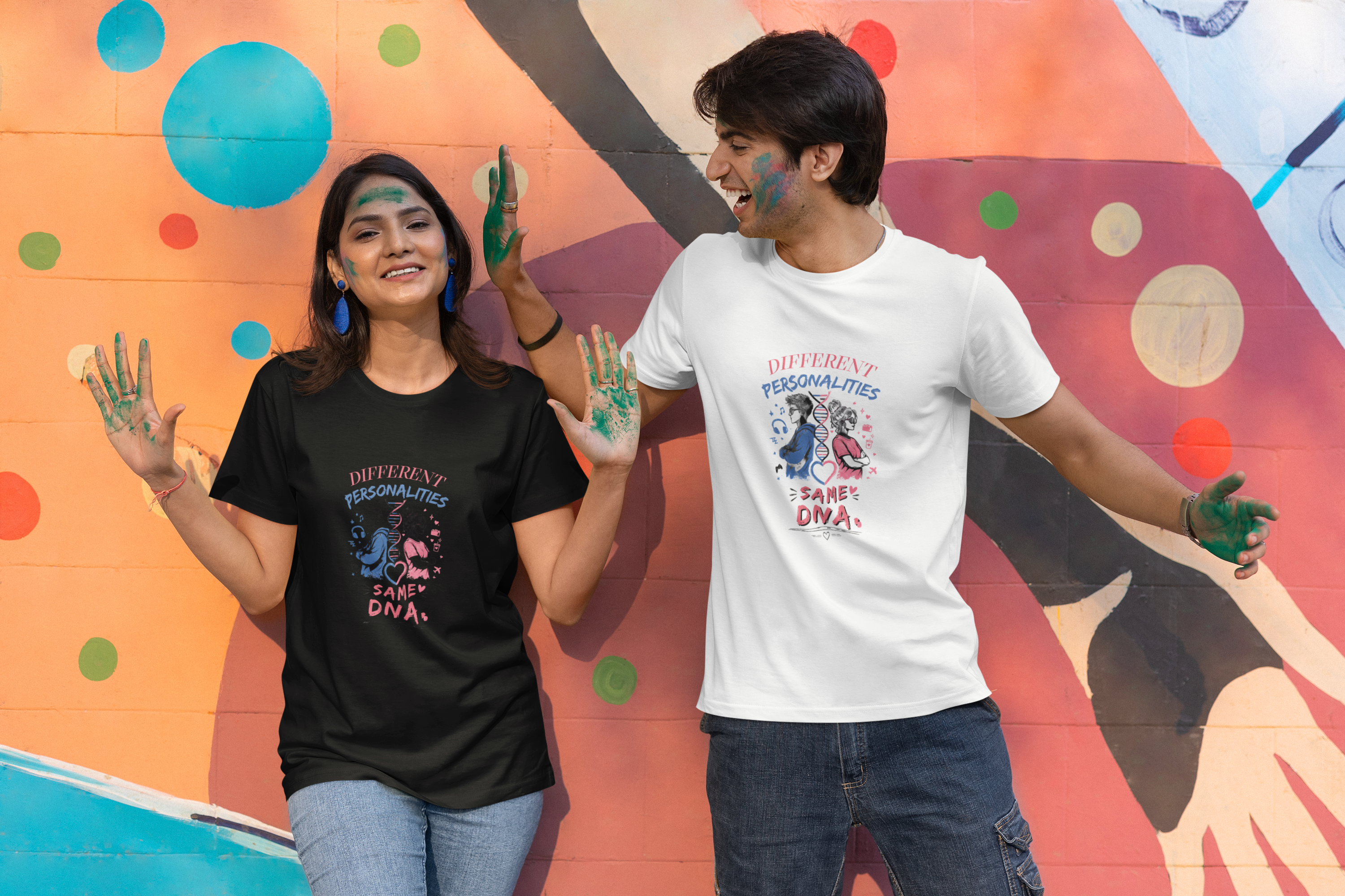scott-international-t-shirt-mockup-of-a-happy-man-and-woman-in-painted-hands-for-holi-m37212.png
