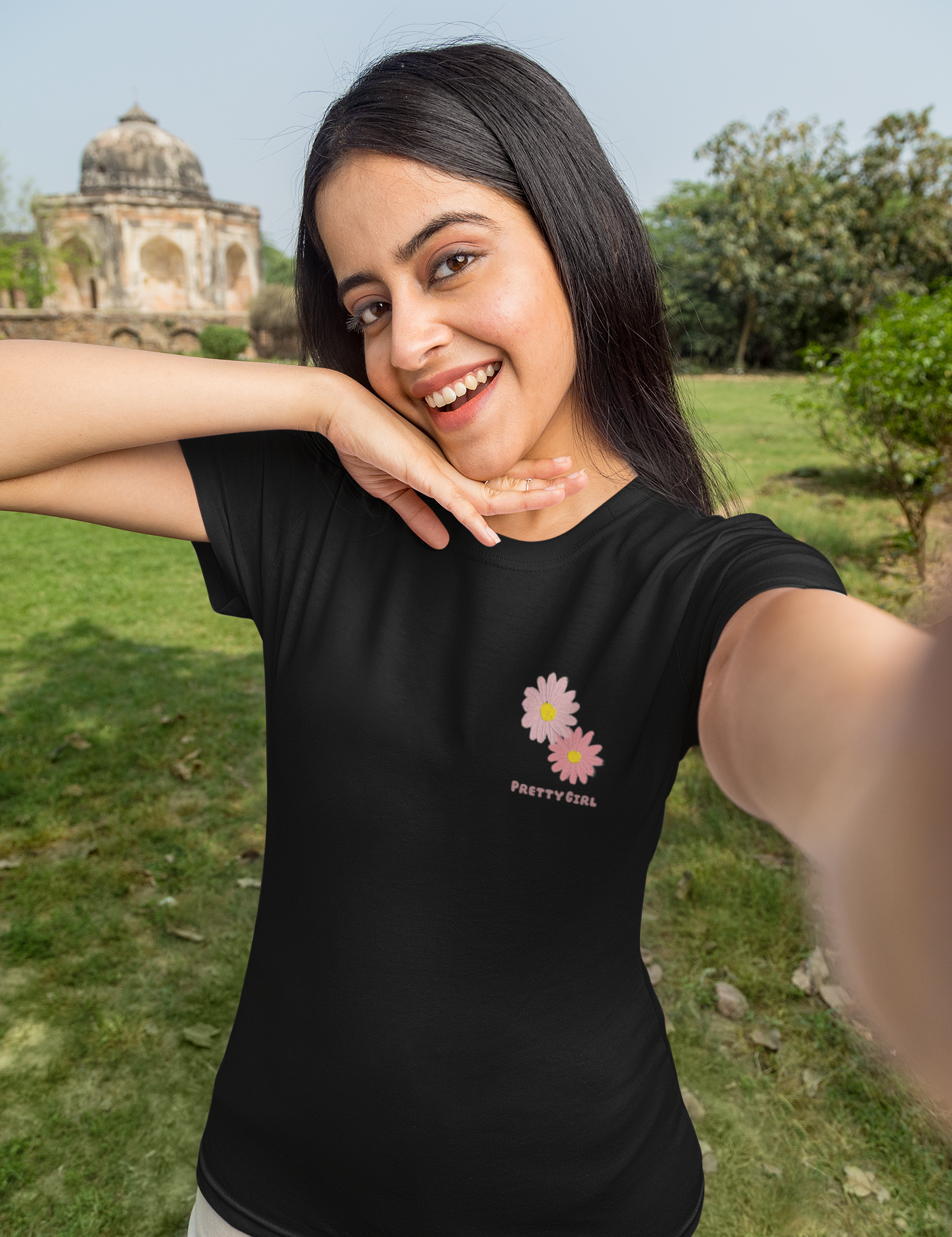 t-shirt-mockup-of-a-happy-woman-taking-a-selfie-in-a-garden-m25833.png